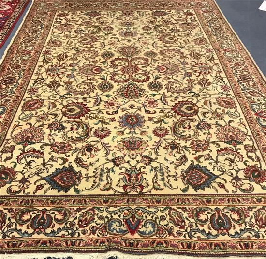 A cream ground Tabriz carpet 335 x 235cm